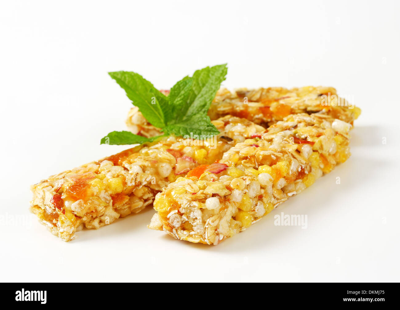 Cereal bars with pieces of dried apricot and apple Stock Photo