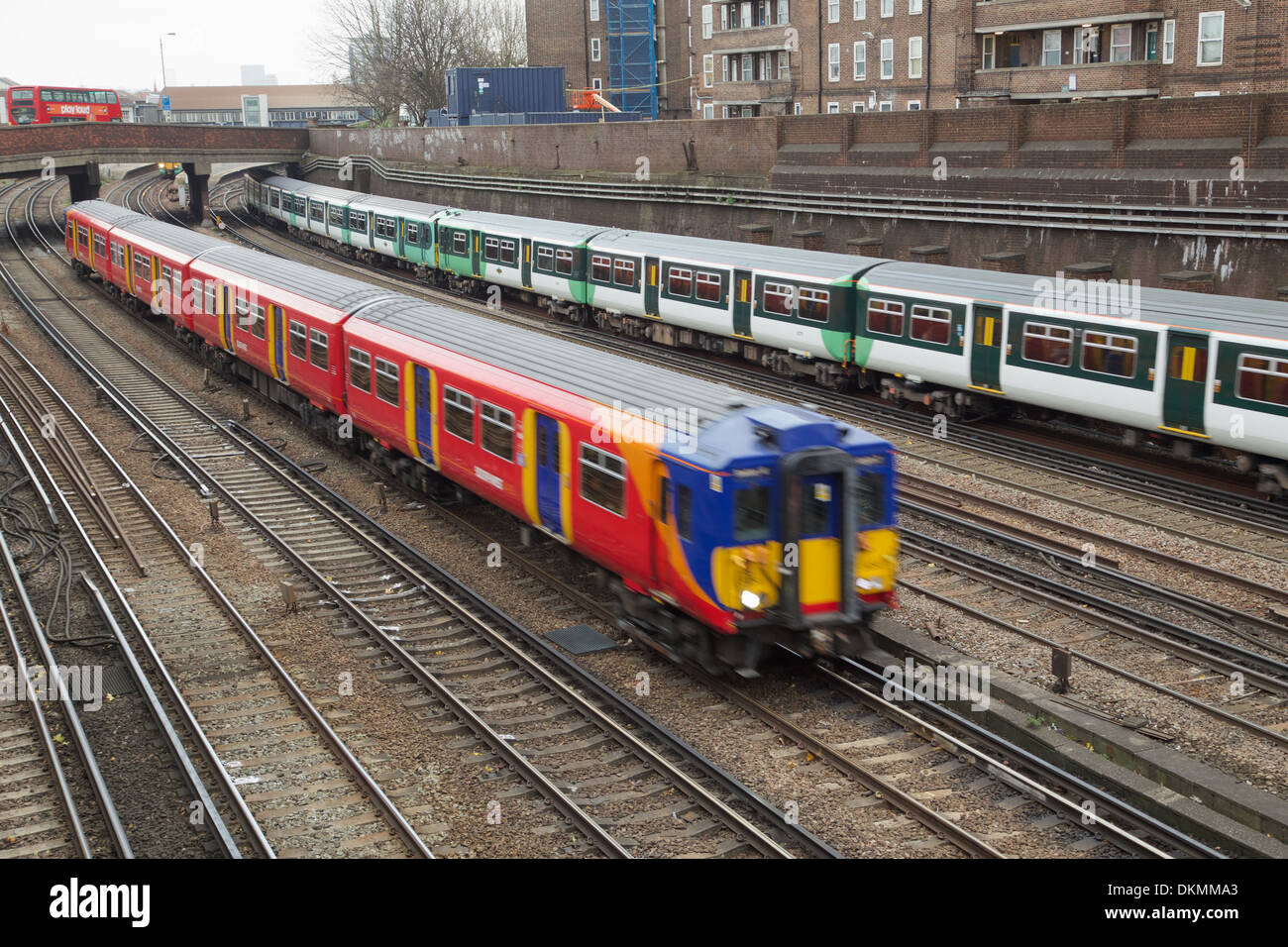 Trains leave Clapham Junction station Stock Photo