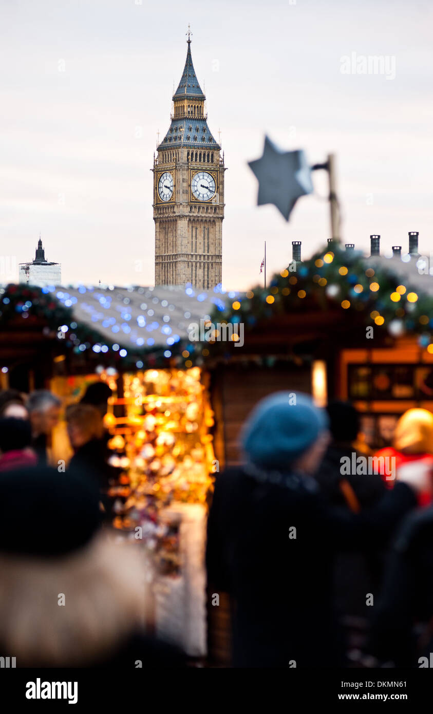 People visit the Southbank Christmas market in London on December 6, 2013. Stock Photo
