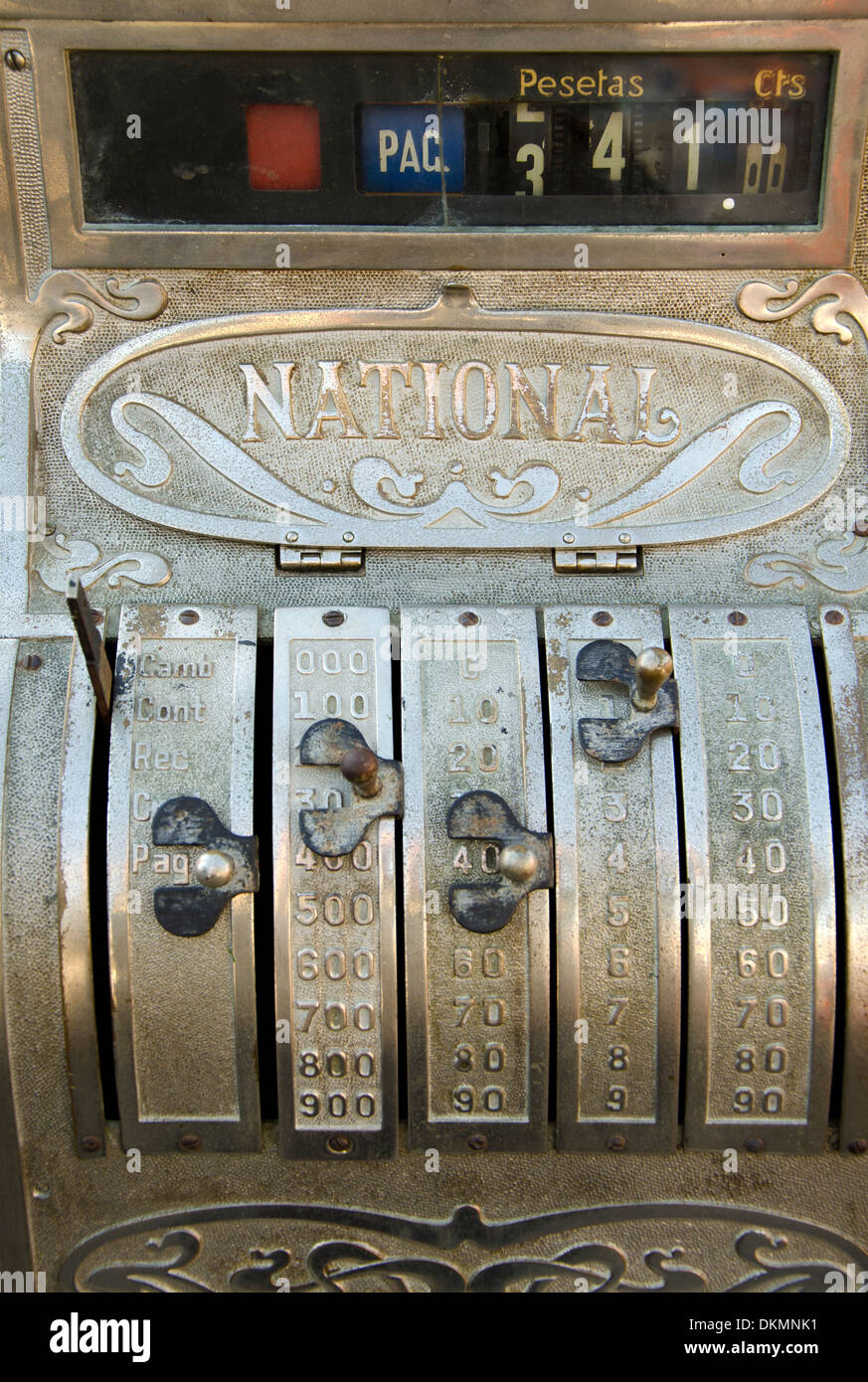 Front of old antique spanish cash register or till, working with pesetas, for sale on second hand market in Fuengirola ,Spain. Stock Photo