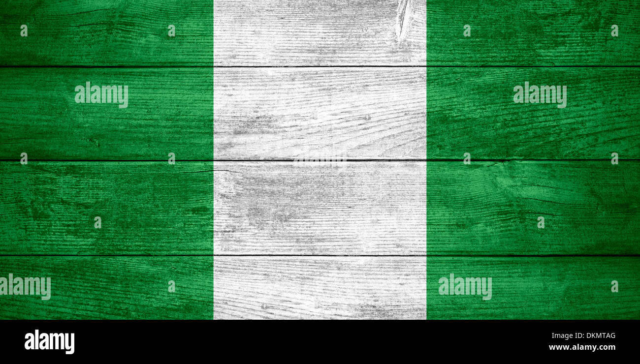 flag of Nigeria or Nigerian banner on wooden background Stock Photo - Alamy