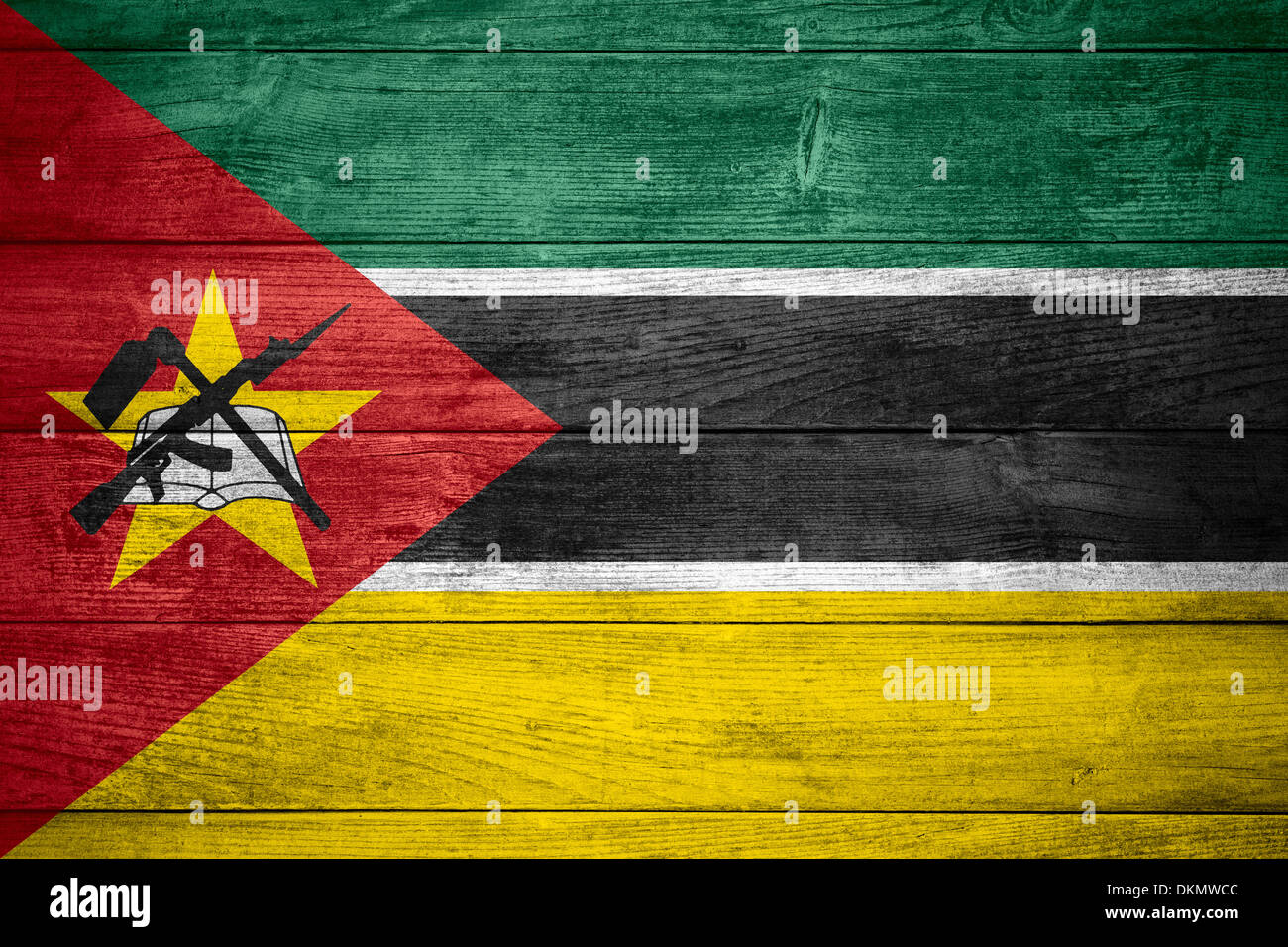 flag of Republic of Mozambique or banner on wooden background Stock Photo