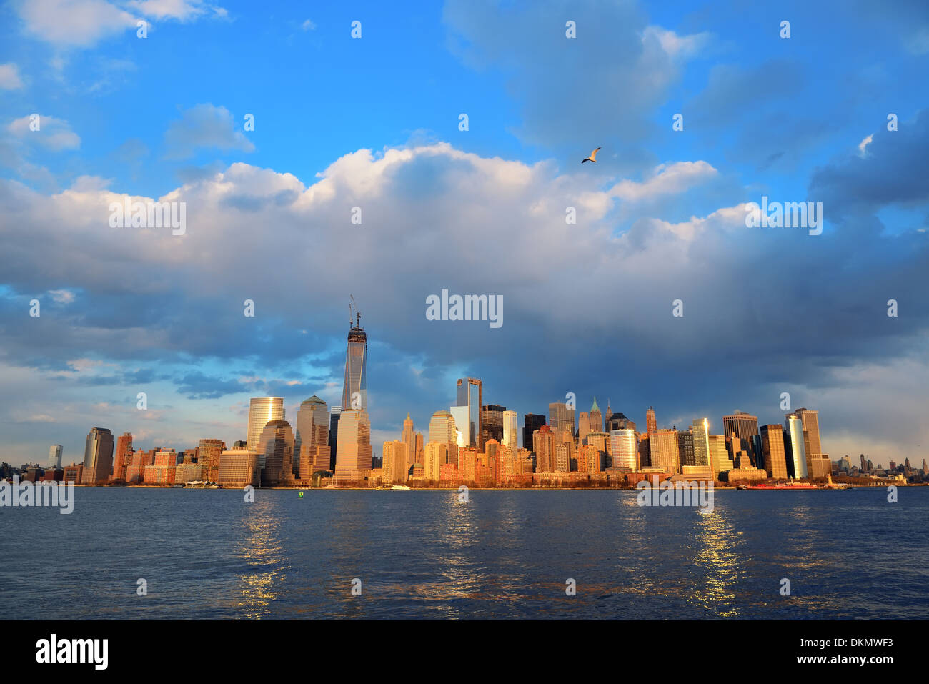 Downtown Manhattan skyline at sunset over Hudson River in New York City ...