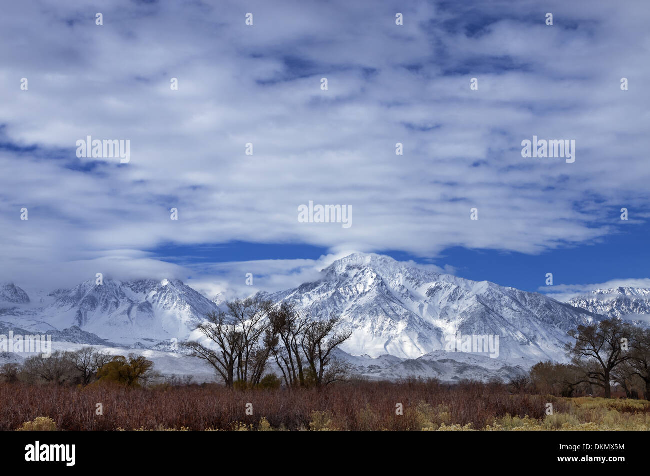 snowy Eastern Sierra mountains from Bishop California including mount Tom and Basin Mountain Stock Photo