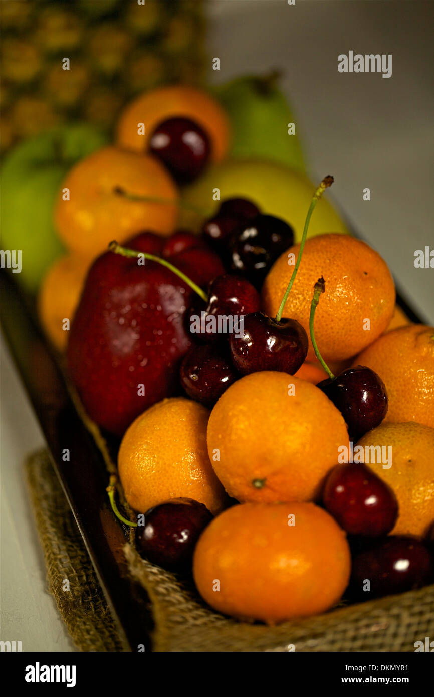 Selection of fresh fruits in a container Stock Photo Alamy