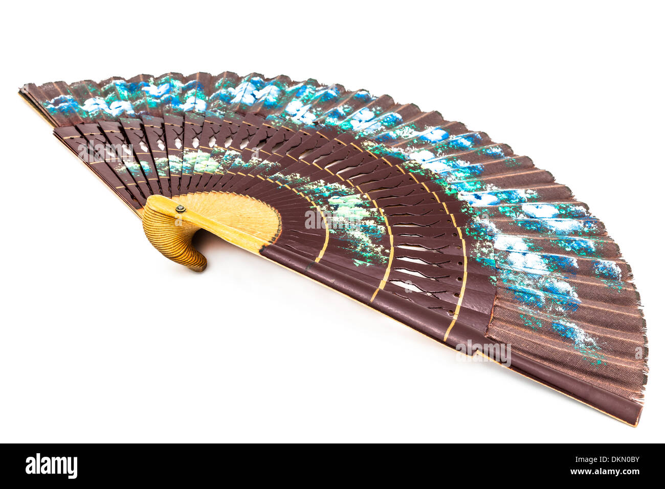 A beautiful spanish fan on a white background Stock Photo - Alamy