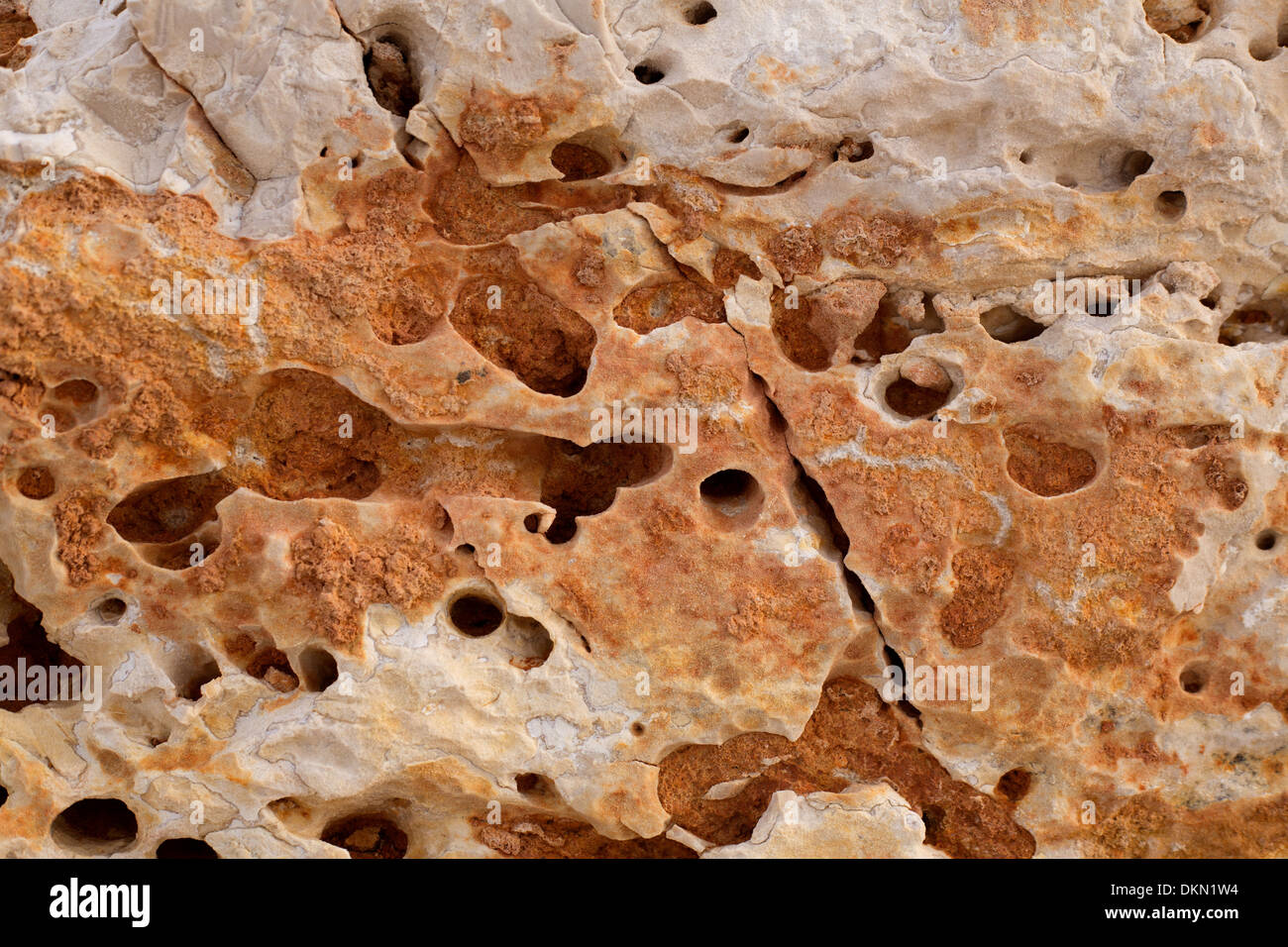 eroded weathered limestone in Mediterranean shoreline at Spain Stock Photo