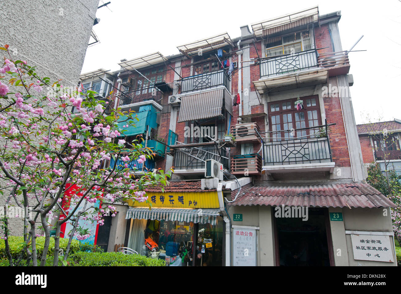 House of flats in Huaihai Middle Road - famous shopping street in the former French Concession of Shanghai, China Stock Photo