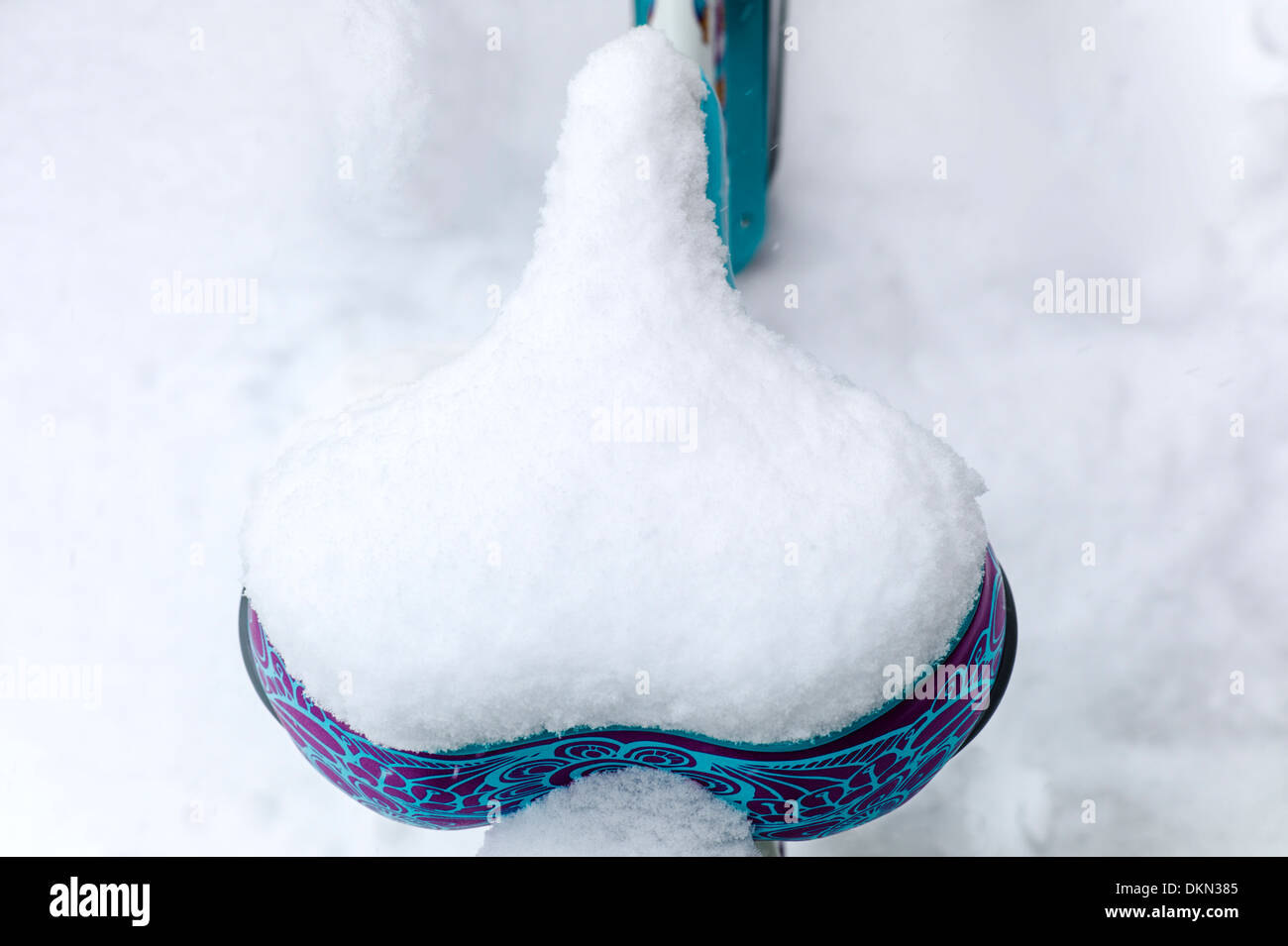 Snowy winter view of bicycle outside a shop in historic downtown Salida, Colorado, USA Stock Photo