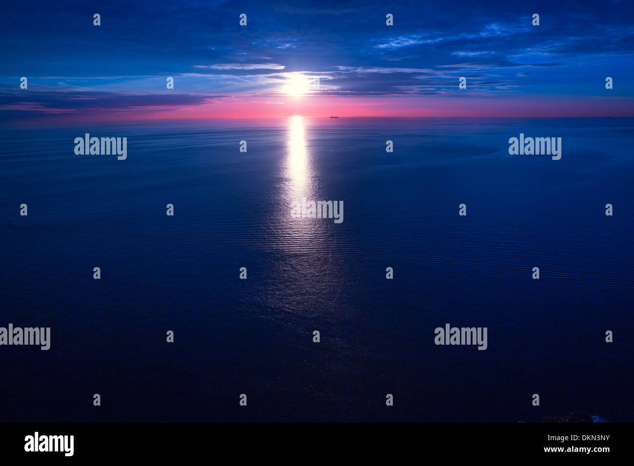 sunset sunrise over blue Mediterranean sea Stock Photo