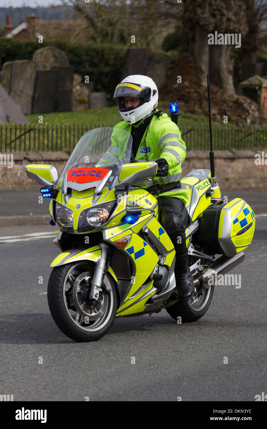Policeman on Yamaha Police motorcycle performing escort duties during Cicle Classic Cycle Race 2013 Stock Photo