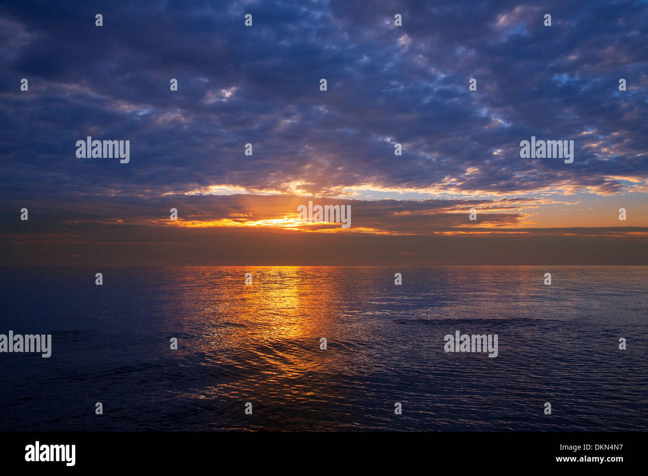sunset sunrise over blue Mediterranean sea Stock Photo