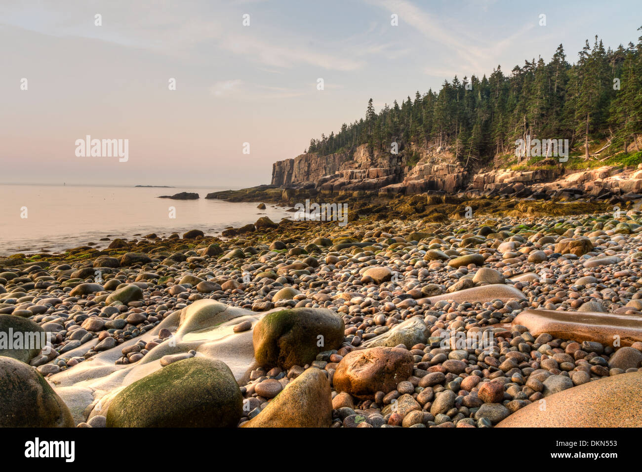 Rounded stones on Boulder Beach looking toward the Otter Cliffs at