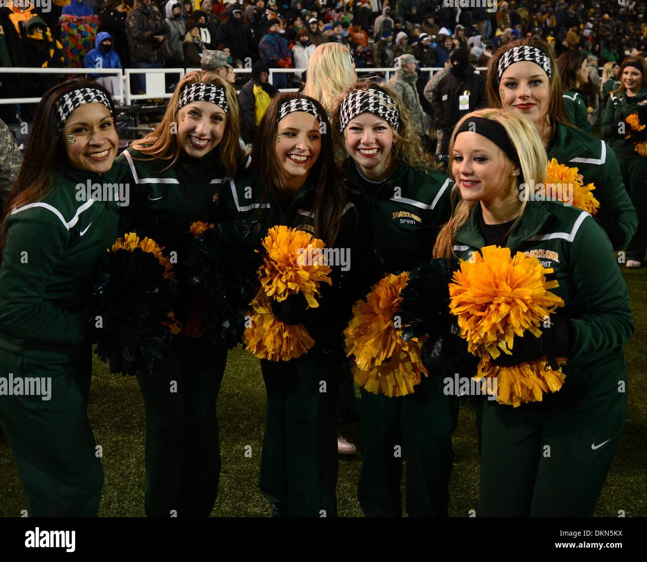Dec 7, 2013. Cheerleaders of the Baylor Bears vs the Texas Longhorns at Floyd Casey Stadium in Waco Texas. Baylor defeats 30-10 to win the Big 12 Championship. Stock Photo