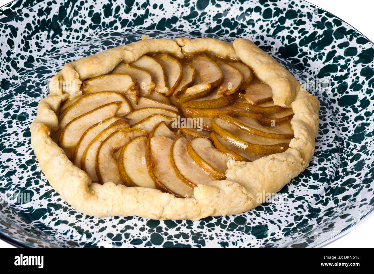 A fresh homemade pear tart baked and served on a plate Stock Photo
