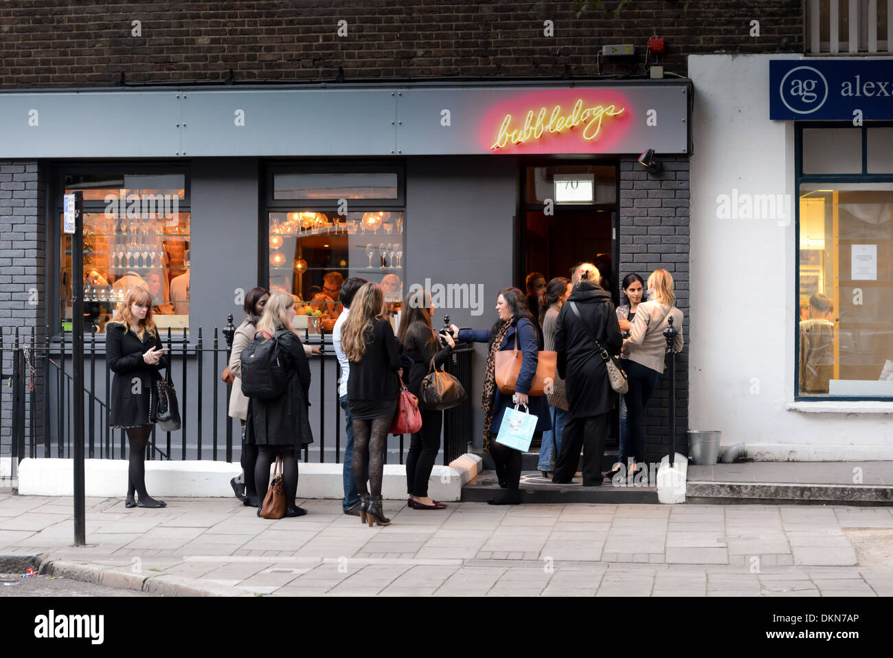 Queues outside the fashionable London restaurant Bubbledogs Stock Photo