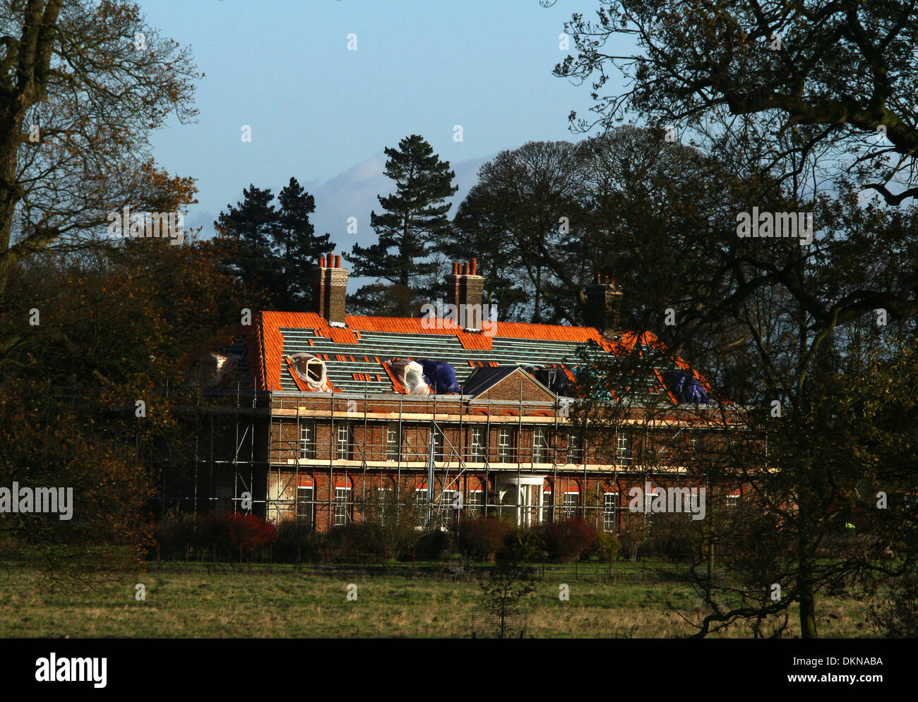 Anmerm Norfolk, UK. 6th Dec 2013. The roof tiles of Anmer Hall are being replaced as renovation and improvement works continue, before The Duke and Duchess of Cambridge move in.  Anmer Hall in Norfolk, is the home given to the Duke and Duchess of Cambridge, Prince William and Kate, as a gift from her Majesty The Queen Elizabeth, to use as a country home for them to share.  Anmer Hall is a late Georgian country house which sits in the grounds of the Sandringham estate and is just two miles east of the Queen's Sandringham House. Credit:  Paul Marriott/Alamy Live News Stock Photo