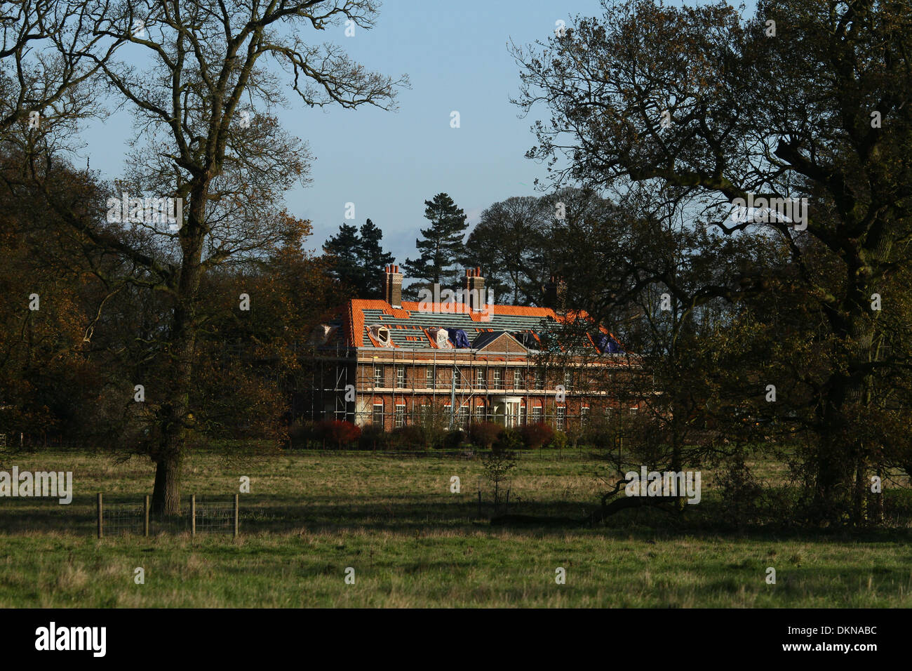 Anmerm Norfolk, UK. 6th Dec 2013. The roof tiles of Anmer Hall are being replaced as renovation and improvement works continue, before The Duke and Duchess of Cambridge move in.  Anmer Hall in Norfolk, is the home given to the Duke and Duchess of Cambridge, Prince William and Kate, as a gift from her Majesty The Queen Elizabeth, to use as a country home for them to share.  Anmer Hall is a late Georgian country house which sits in the grounds of the Sandringham estate and is just two miles east of the Queen's Sandringham House. Credit:  Paul Marriott/Alamy Live News Stock Photo