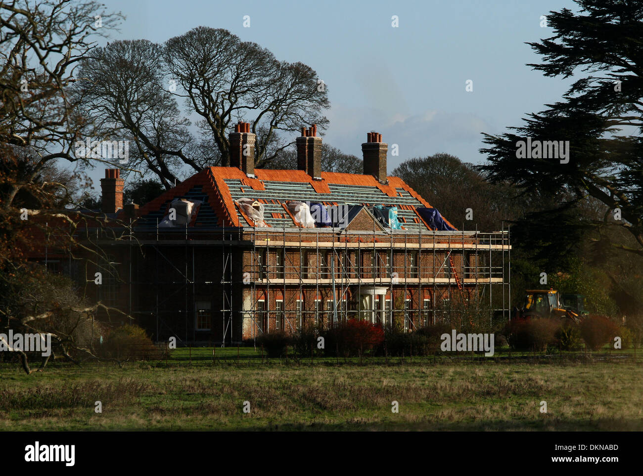 Anmerm Norfolk, UK. 6th Dec 2013. The roof tiles of Anmer Hall are being replaced as renovation and improvement works continue, before The Duke and Duchess of Cambridge move in.  Anmer Hall in Norfolk, is the home given to the Duke and Duchess of Cambridge, Prince William and Kate, as a gift from her Majesty The Queen Elizabeth, to use as a country home for them to share.  Anmer Hall is a late Georgian country house which sits in the grounds of the Sandringham estate and is just two miles east of the Queen's Sandringham House. Credit:  Paul Marriott/Alamy Live News Stock Photo