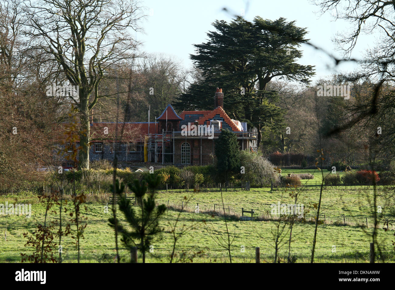 Anmerm Norfolk, UK. 6th Dec 2013. The roof tiles of Anmer Hall are being replaced as renovation and improvement works continue, before The Duke and Duchess of Cambridge move in.  Anmer Hall in Norfolk, is the home given to the Duke and Duchess of Cambridge, Prince William and Kate, as a gift from her Majesty The Queen Elizabeth, to use as a country home for them to share.  Anmer Hall is a late Georgian country house which sits in the grounds of the Sandringham estate and is just two miles east of the Queen's Sandringham House. Credit:  Paul Marriott/Alamy Live News Stock Photo
