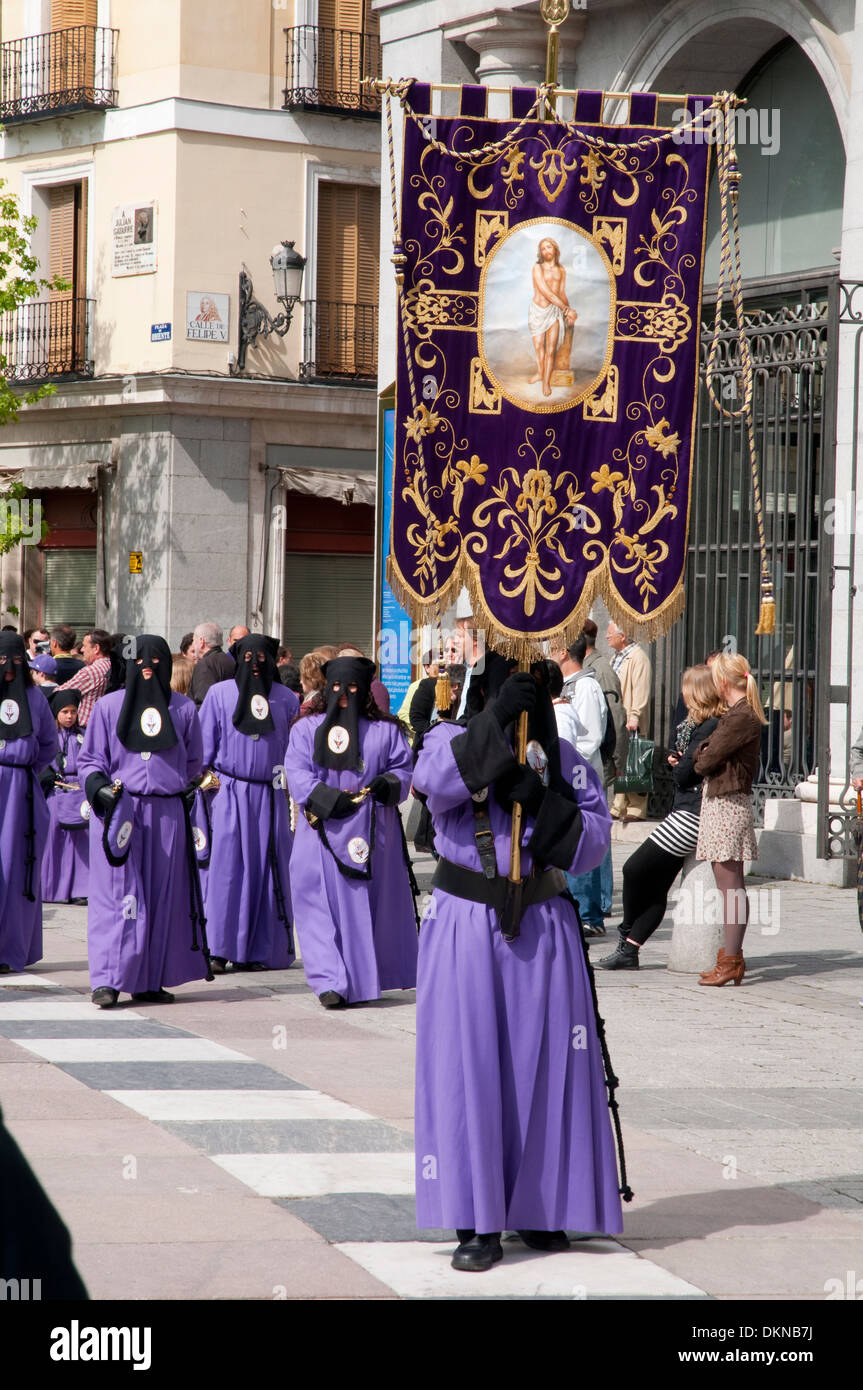 Nazarenos in a Holy Week procession. Oriente Square, Madrid, Spain. Stock Photo