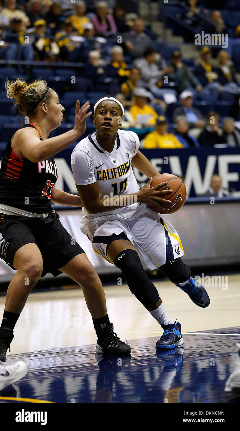 Berkeley, CA, USA. 7th Dec, 2013. Dec 07 2013 - Berkeley CA USA California Bears G # 10 Mercedes Jefflo drive to the middle of the paint against Pacific # 11 Madison Parrish and score on a one handed lay up during NCAA Womens Basketball game between Pacific University Tigers and California Golden Bears 68-66 overtime win at Hass Pavilion Berkeley Calif Credit:  csm/Alamy Live News Stock Photo