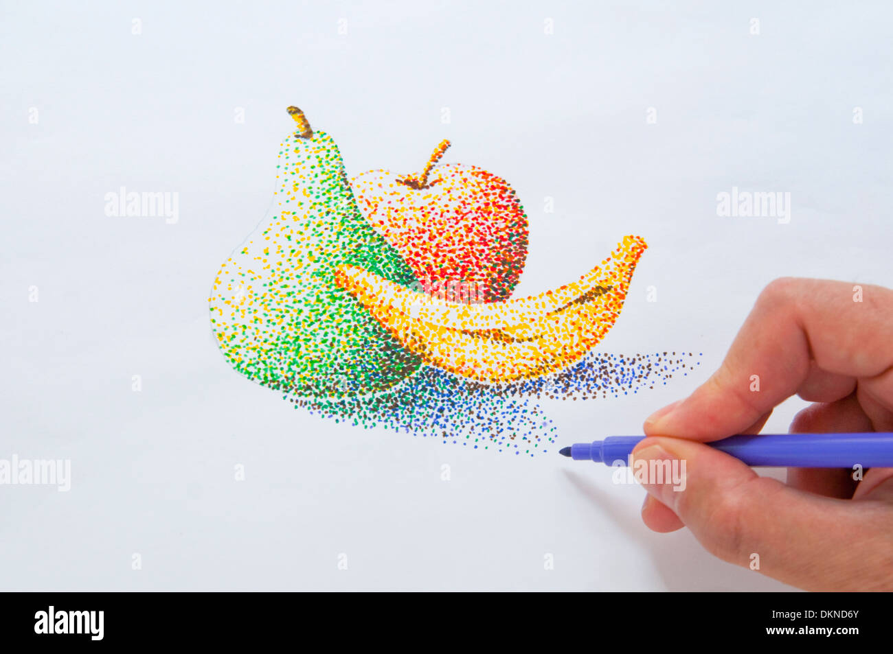 Man's hand making a pointillism drawing with color markers. Close view. Stock Photo