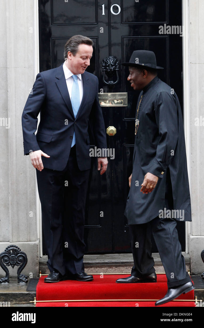 British Prime Minister David Cameron (L) welcomes Nigerian President Goodluck Ebele Azikiwe Jonathan Stock Photo