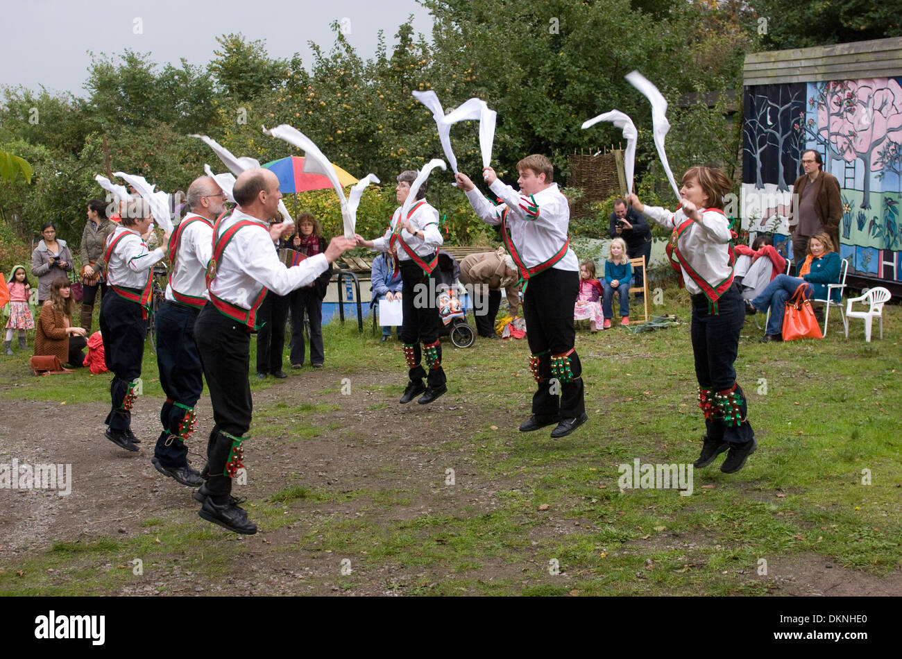 Pigsty Morris dancers, airborne at Horfield Organic Community Orchard (HOCO), Horfield, Bristol Stock Photo