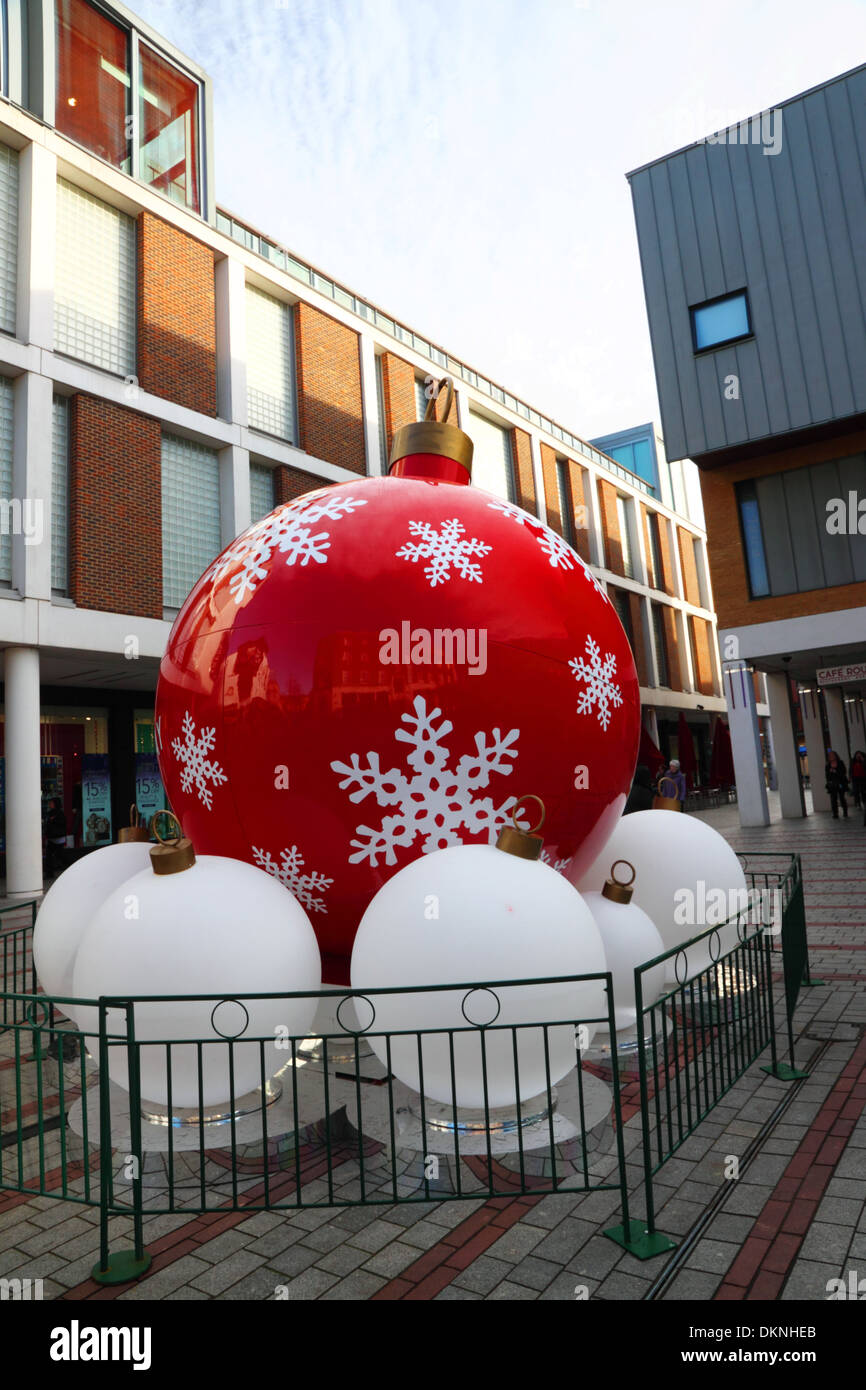 Giant Christmas baubles in a modern shopping centre. Stock Photo