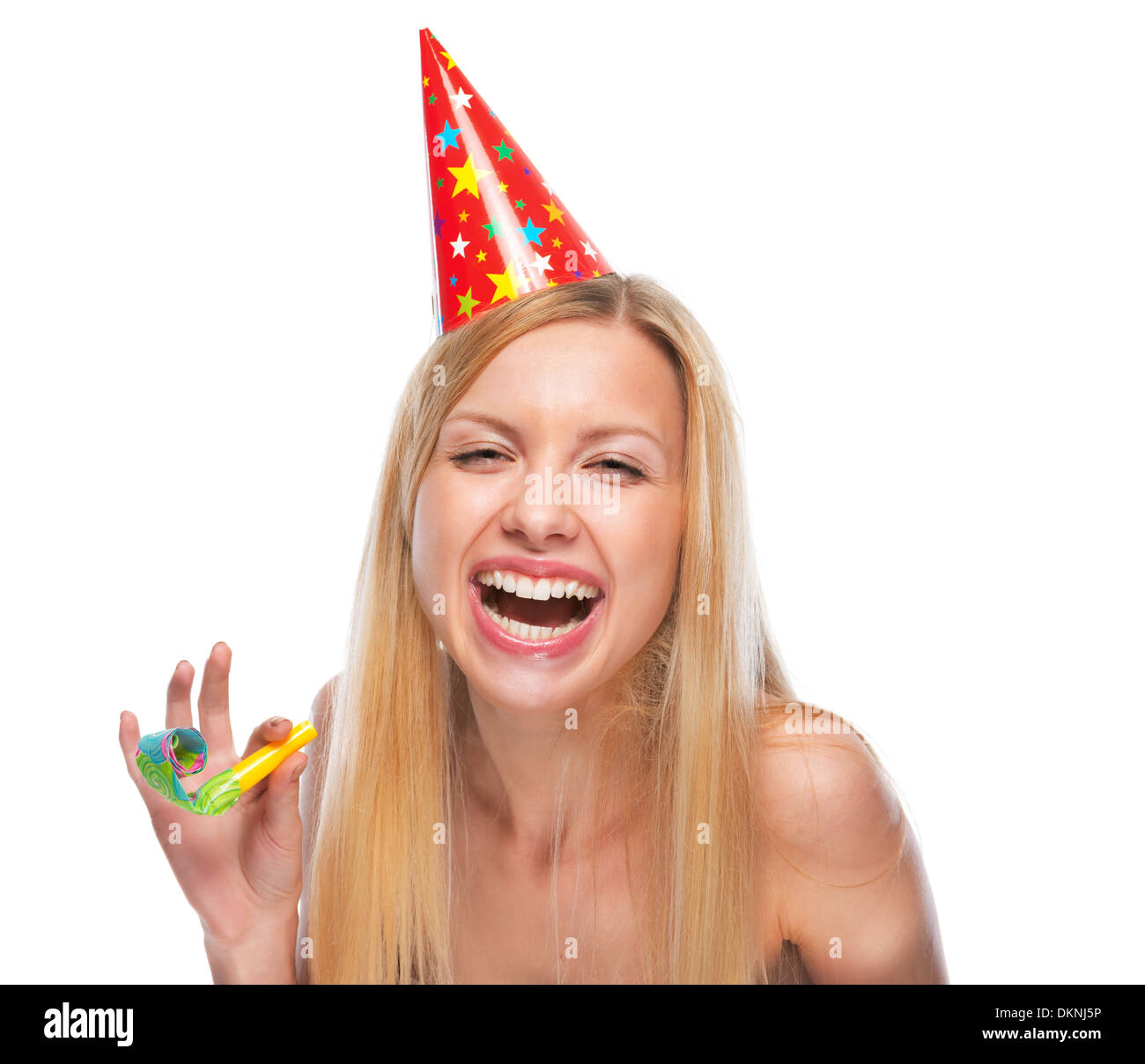 Portrait of happy teenage girl in cap with party horn blower Stock ...