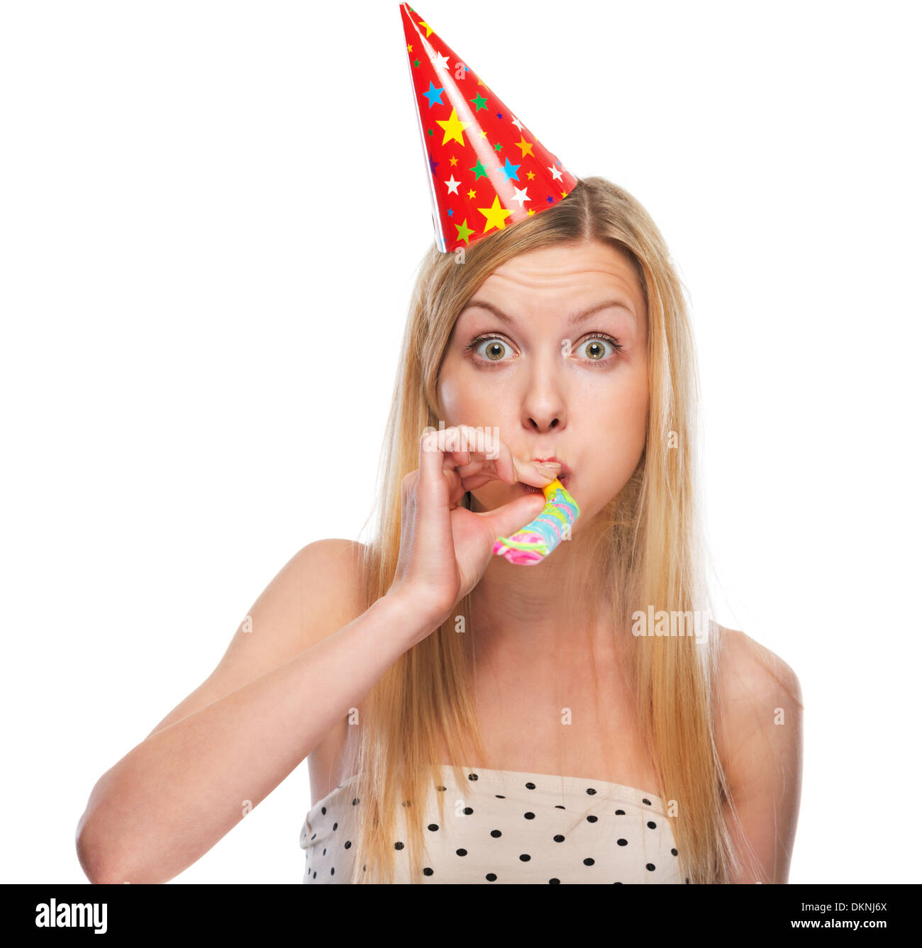 Girl blowing party horn hi-res stock photography and images - Alamy