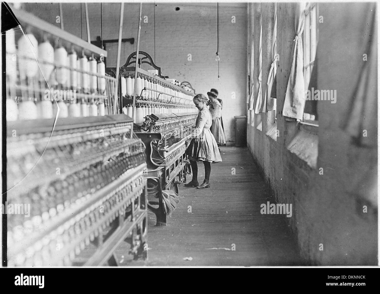 Hattie Hunter, spinner in the Lancaster Cotton Mills. 52 inches high. Worked in mill for three years. Gets 50 (cents)... 523124 Stock Photo