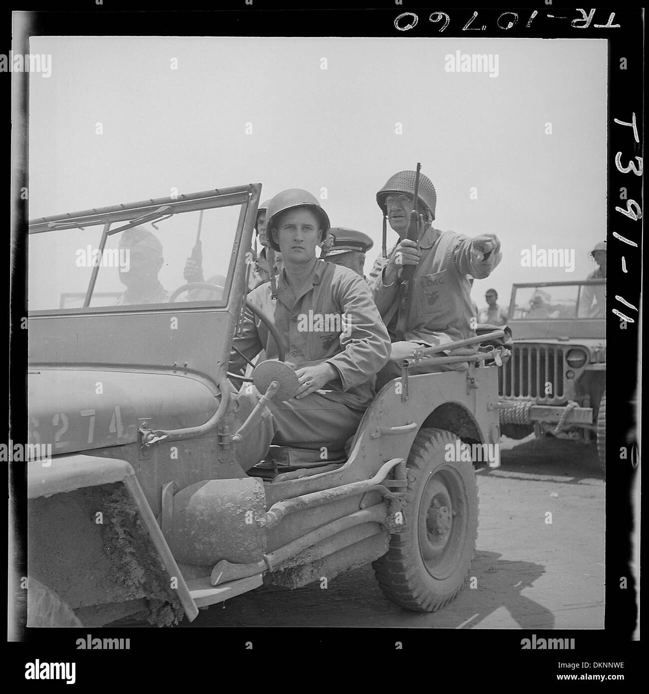 Lt. Gen. Holland M. Smith (right) USMC takes jeep tour of Saipan airfield. 520968 Stock Photo