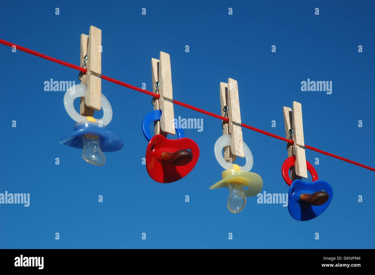 (dpa FILE) Illustration - An archive picture, dated 14 June 2013, shows a set of dummies hanging from a washing line in Germany. Fotoarchiv für Zeitgeschichte - ATTENTION! NO WIRE SERVICE - Stock Photo