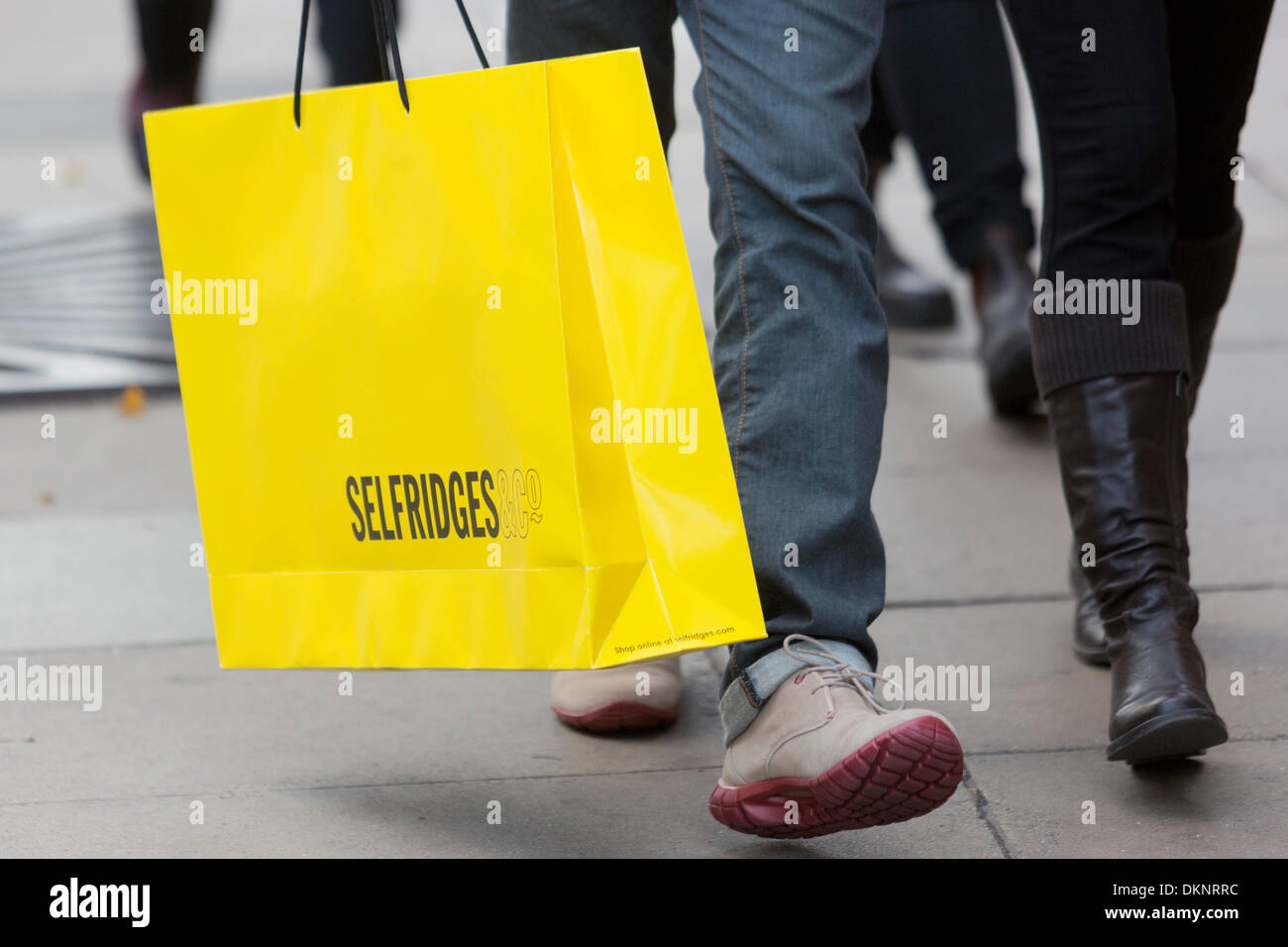 London, UK. 8 December 2013. Shoppers were out and about in a busy Oxford Street to gather more presents for Christmas. Photo: Nick Savage/Alamy Live News Stock Photo