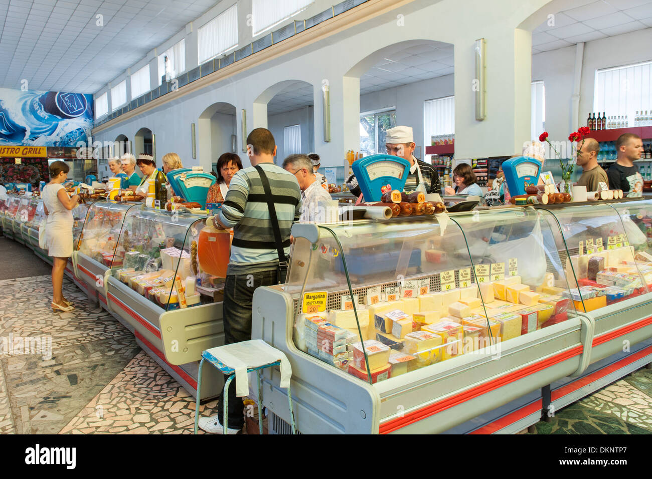 Interior of the dairy and delicatessen market in Chisinau, the capital of Moldova in Eastern Europe. Stock Photo