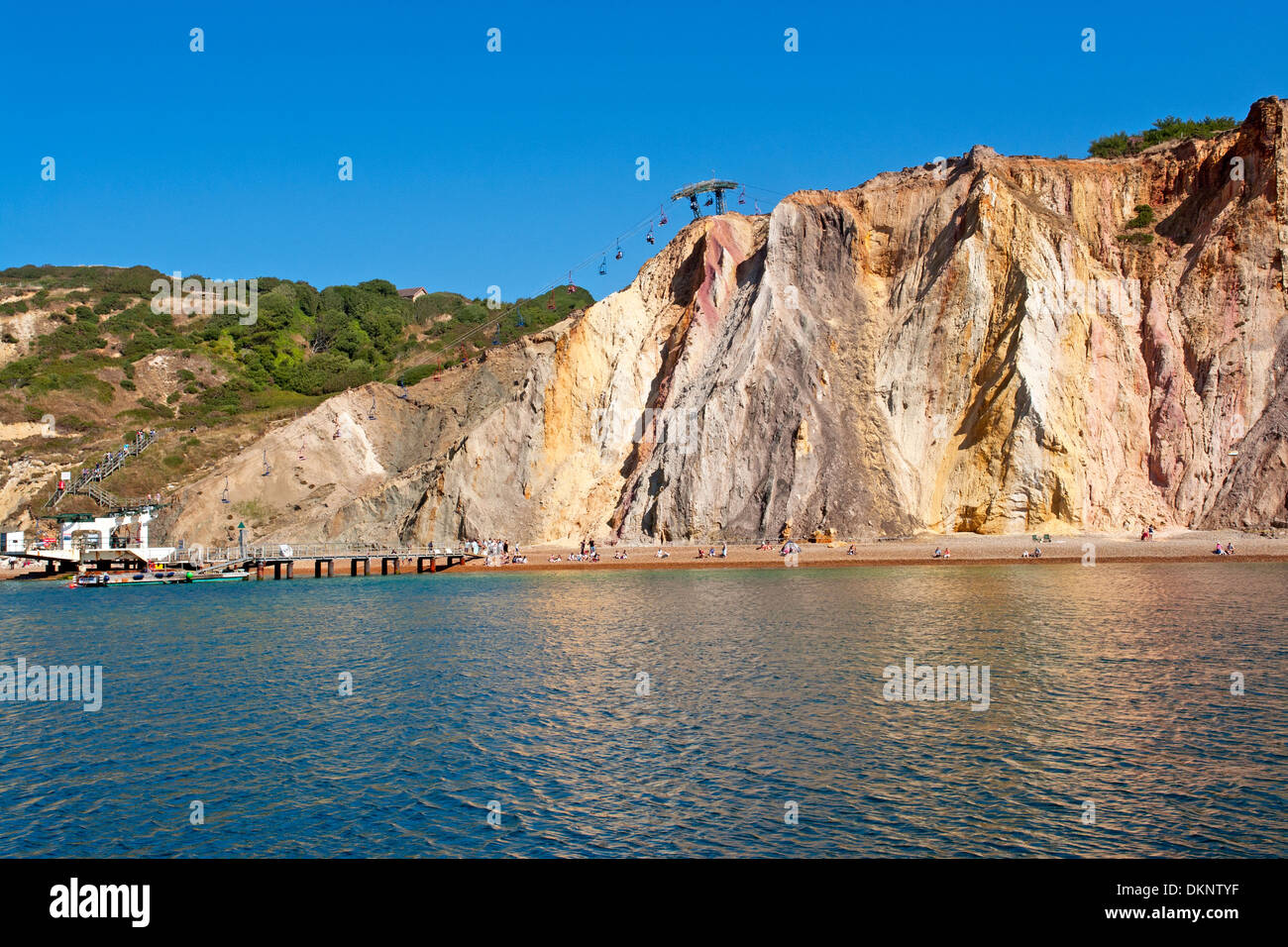 The multi-coloured cliffs at Alum Bay on the south west tip of the Isle of Wight Stock Photo