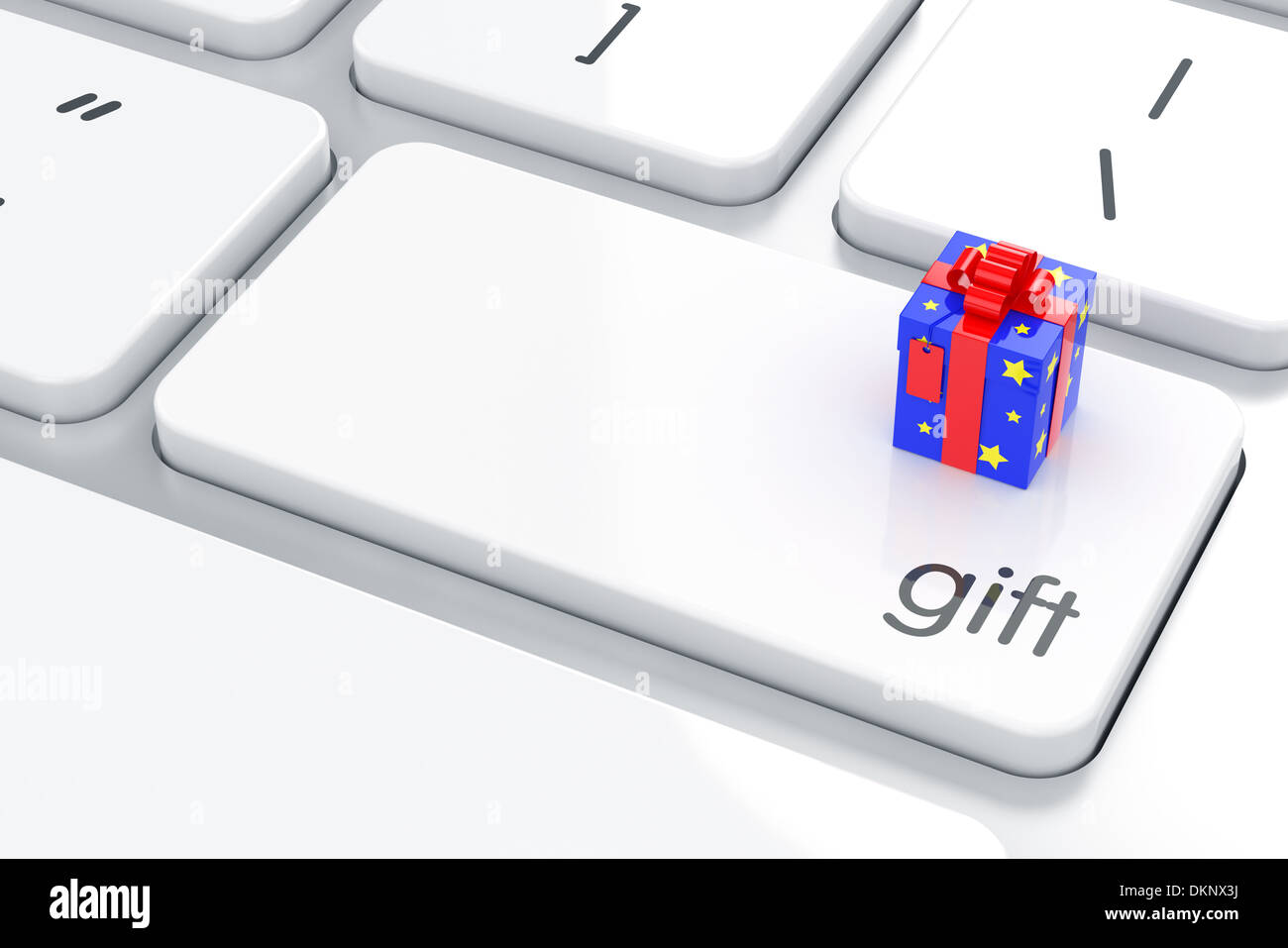 Gift box on the computer keyboard. Present concept Stock Photo Alamy