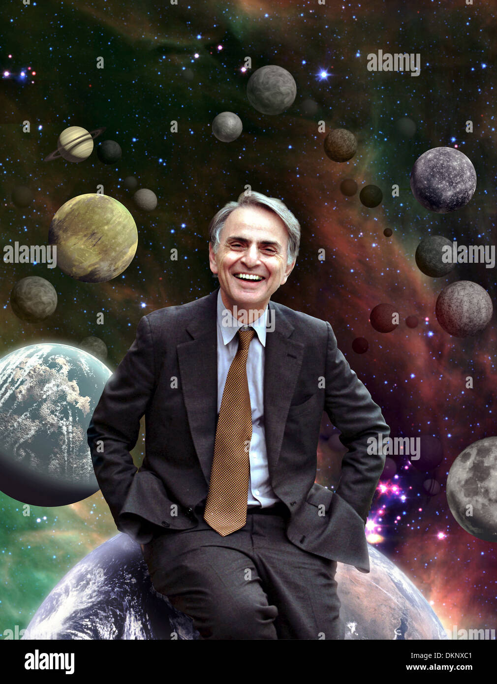 Author and Scientist Carl Sagan poses in front of the solar system. Stock Photo