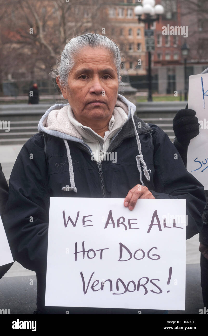New York, NY, USA. 8th Dec, 2013. Rally in Washington Square Park to keep the hot dog vendors. Blogger Cathryn Swan, who writes the WashingtonSquareBlog recently learned the newly formed Washington Square Park Conservancy has asked the NYC Parks Dept not to renew the vendor's contracts, but rather replace them with more upscale and expensive offering. Credit: Stacy Walsh Rosenstock/Alamy Live News Stock Photo
