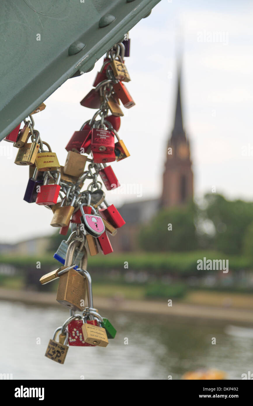 colorful locks hang from a bridge over the Main river in Frankfurt, Germany Stock Photo Alamy