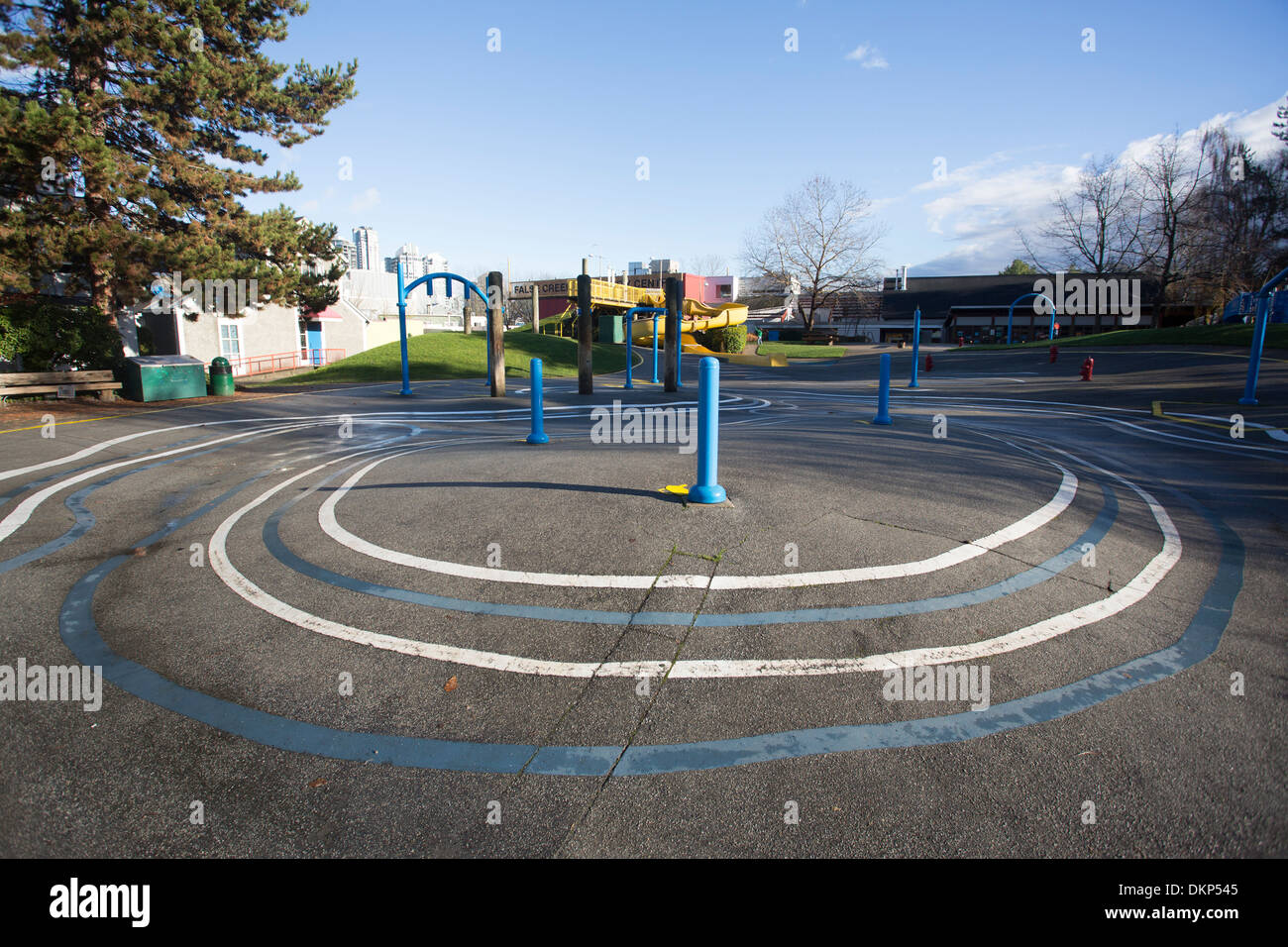 Playground with painted blue circles in False Creek, Vancouver, British Columbia, Canada. Stock Photo