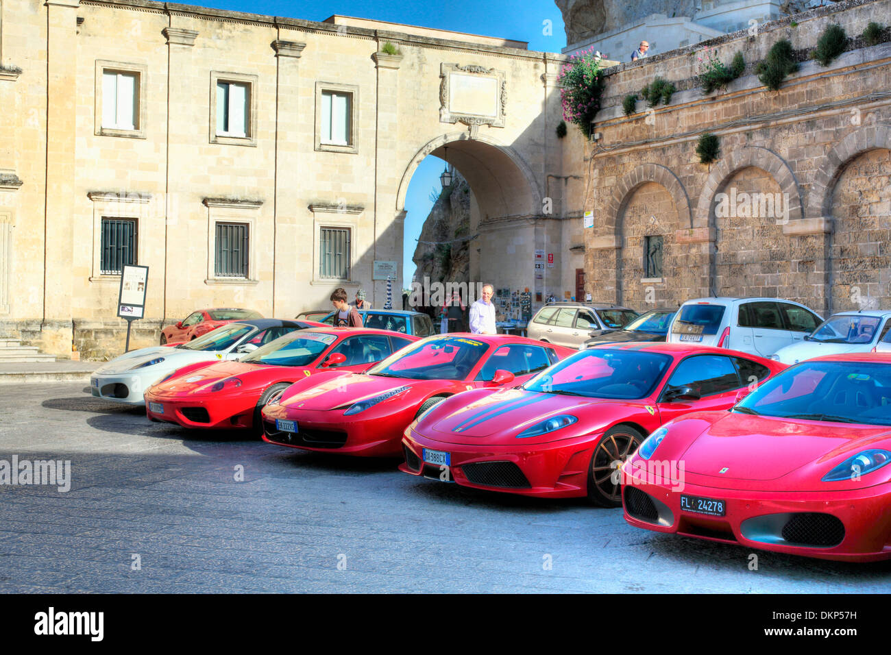 Red Ferrari cars, Sassi di Matera, Basilicata, Italy Stock Photo