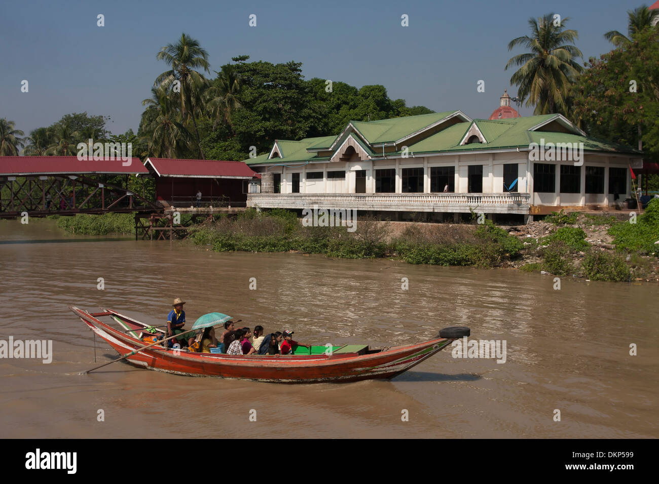 A boat on a river in  Yangon, Myanmar. Stock Photo
