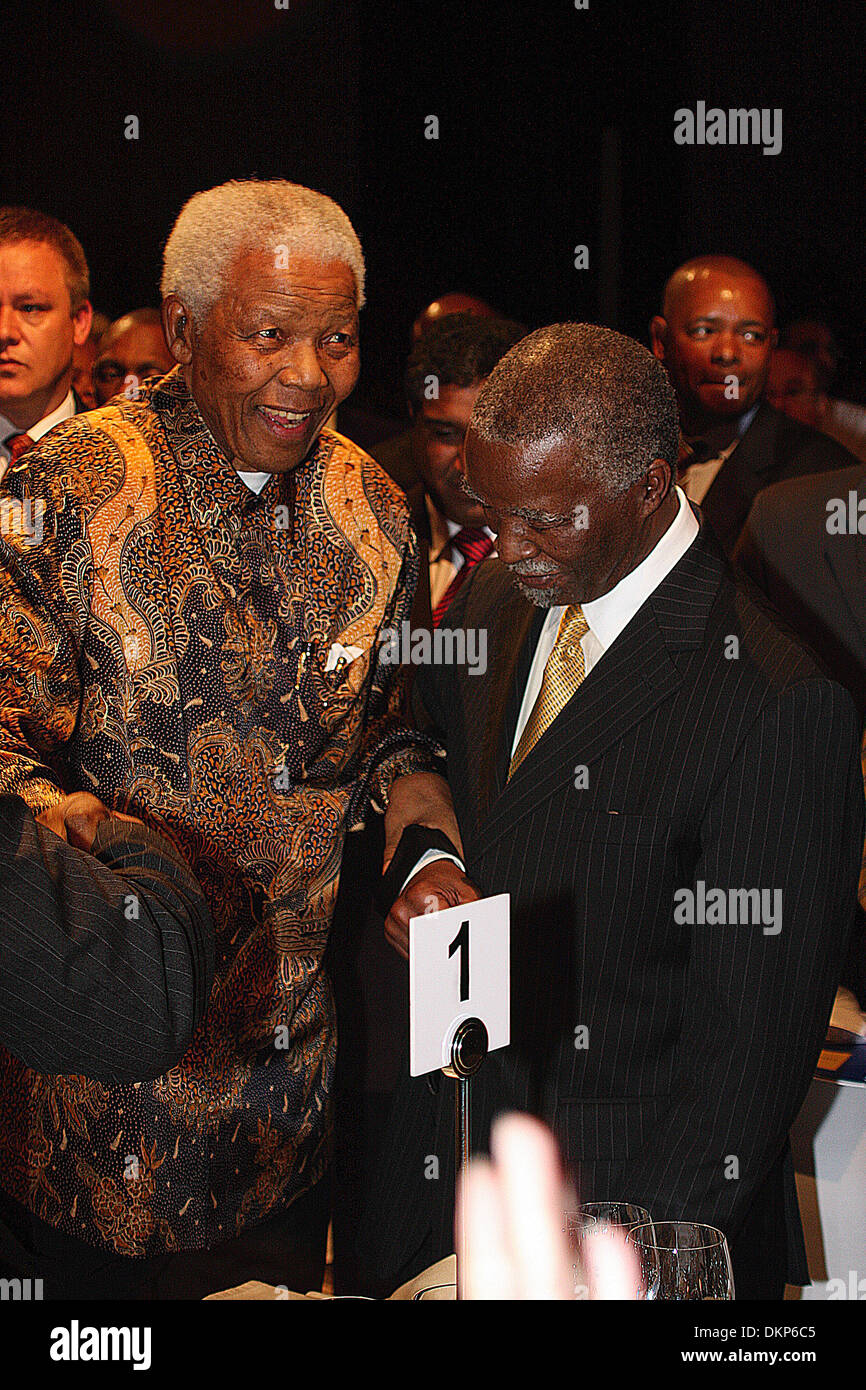 Portrait of a smiling Nelson Rolihlahla Mandela with former South African President Thabo Mbeki at a function in Johannesburg in November 2008.   Nelson Mandela was the first, democratically-elected, post-apartheid President of South Africa Stock Photo