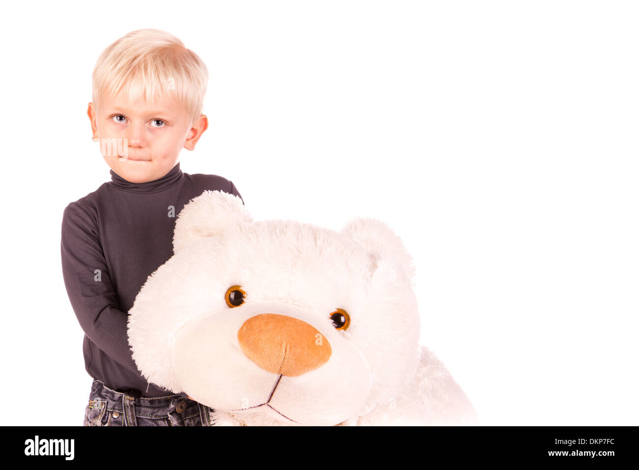 Cute little boy standing with big white bear isolated on white Stock ...