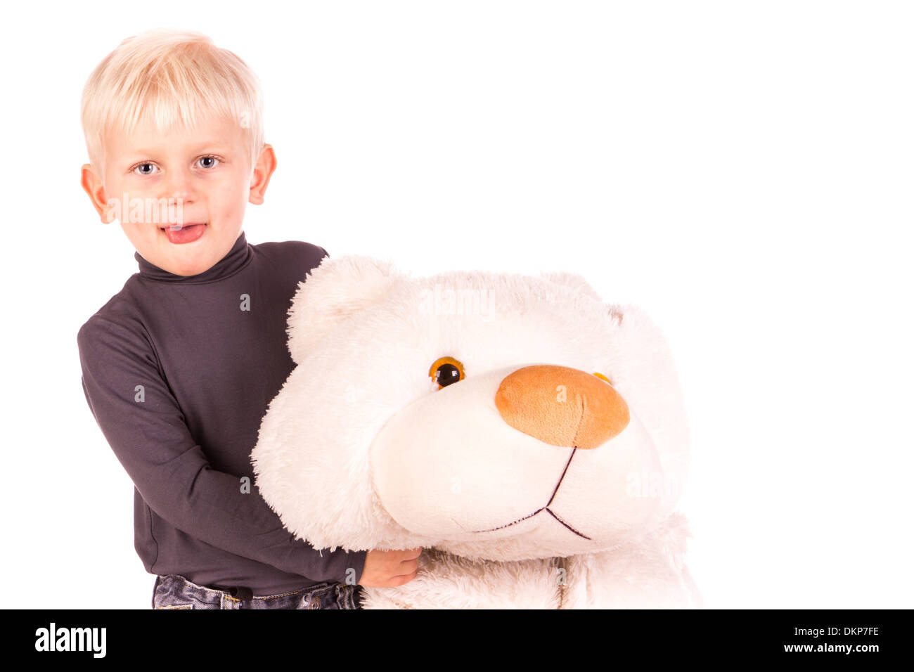 Cute little boy standing with big white bear isolated on white Stock ...