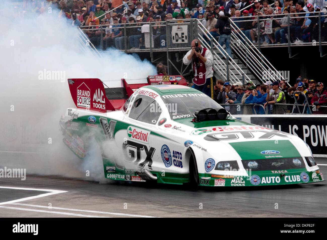 May 17, 2009 - Bristol, Tennessee, U.S - 17 May 2009: Funny Car driver Ashley Force-Hood sends a big cloud of tire smoke into the air during her burnout. The 9th annual Thunder Valley Nationals were held at Bristol Dragway in Bristol, Tennessee. (Credit Image: © Alan Ashley/Southcreek Global/ZUMApress.com) Stock Photo