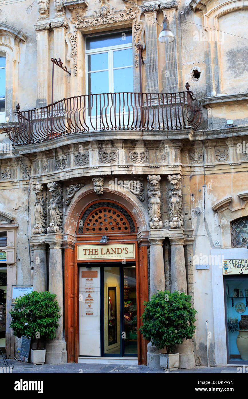 Portal of baroque house, street in old town, Noto, Sicily, Italy Stock Photo